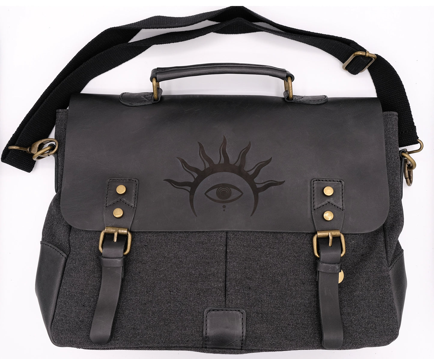 A black leather satchel engraved with a mystic eye with a solar crown. Dark academia style