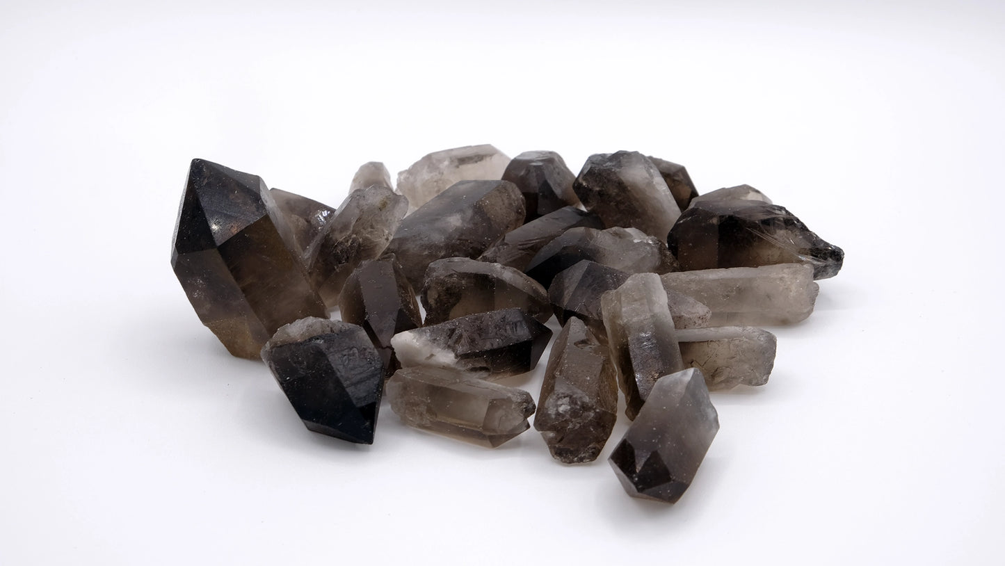 A composition of smoky quartz tips in prism shape