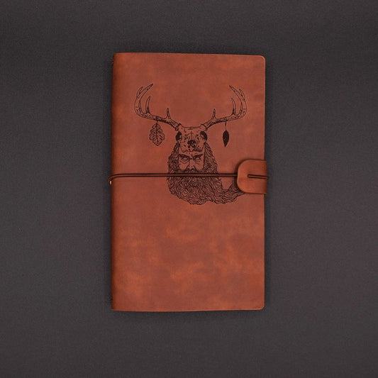 A vintage vegan leather diary engraved with a mystic lesnik from slavic mythology