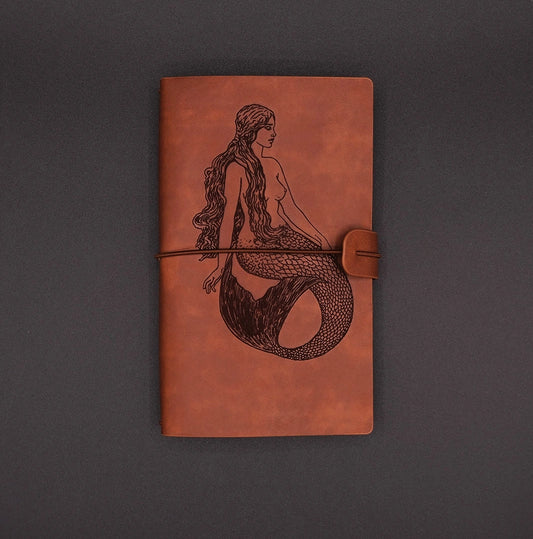 A vintage vegan leather diary engraved with a beautiful mermaid coming from the folklore
