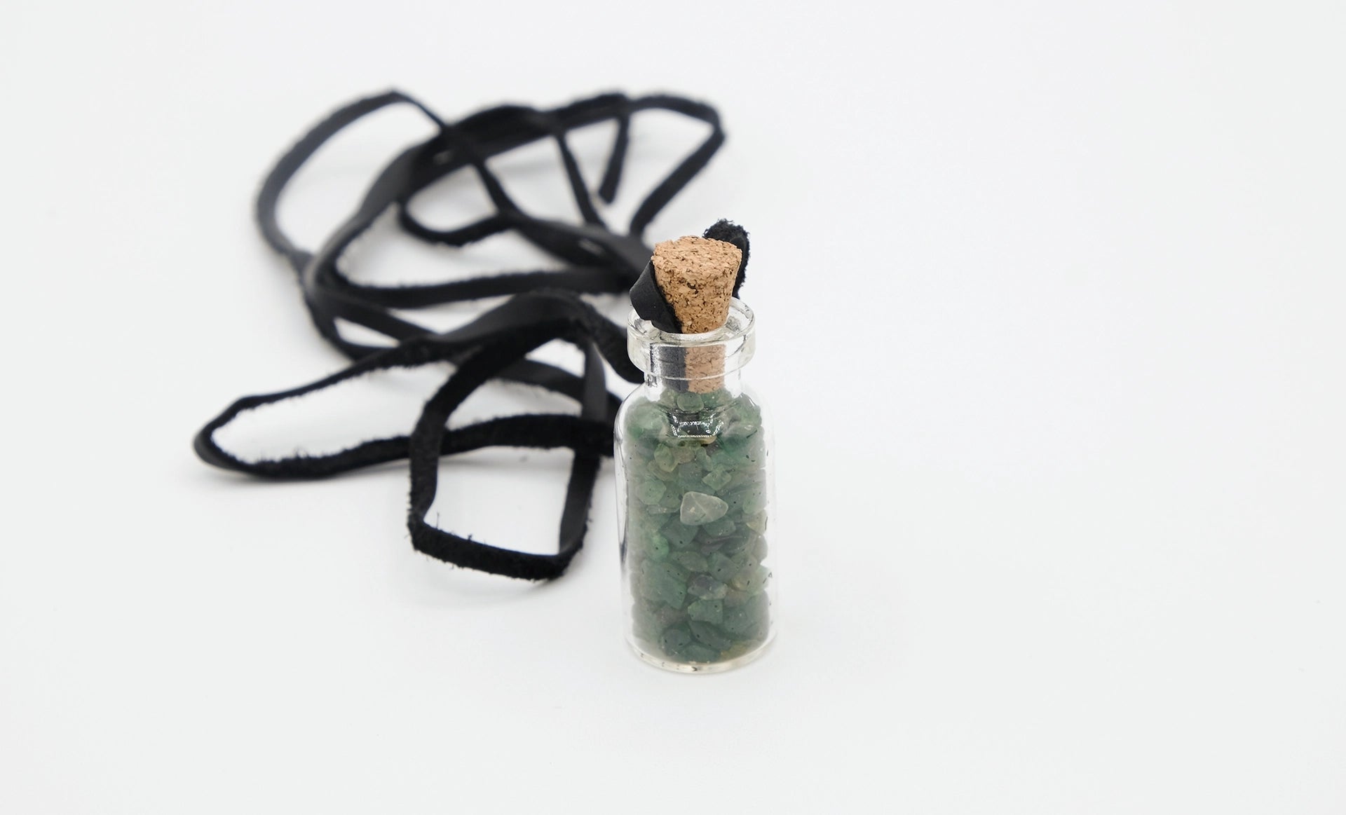 pendant made with a little glass bottle filled with aventurine shards