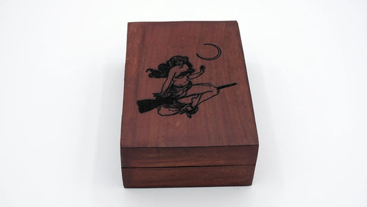 Wooden box engraved with a witch drawn