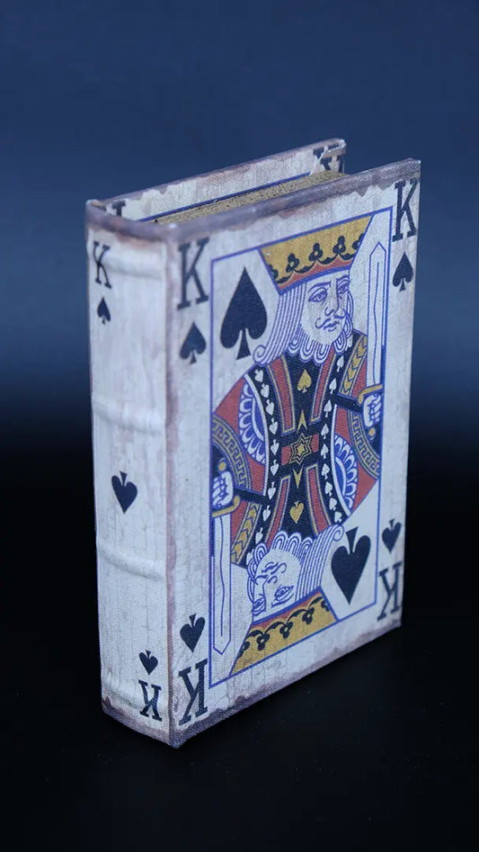 Products Storage box for playing cards King of Spades on the black background.