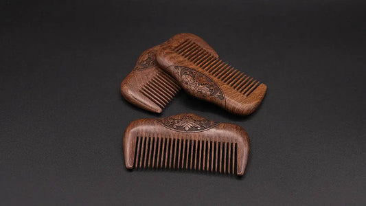 a set of wooden comb with floral motives engraved