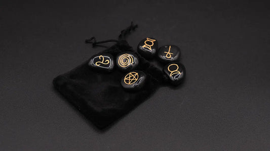 A set of 6 black agate stone with the wicca symbols engraved on them
