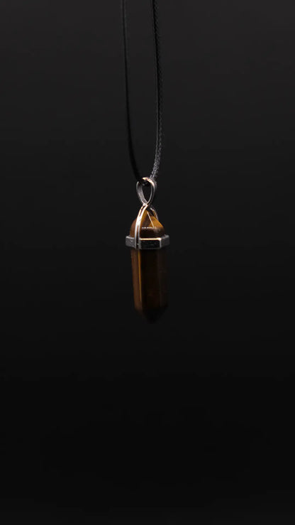 Products Prism Pendant made fromTiger's Eye over the black background.