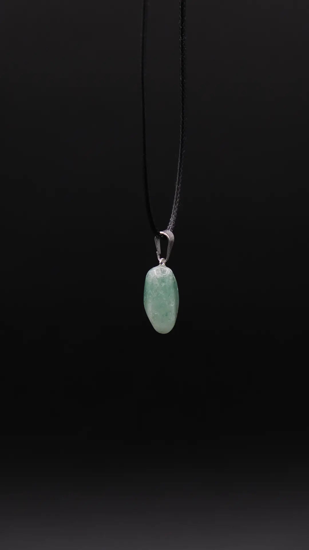 Products Green Fluorite Pendant over the black background.