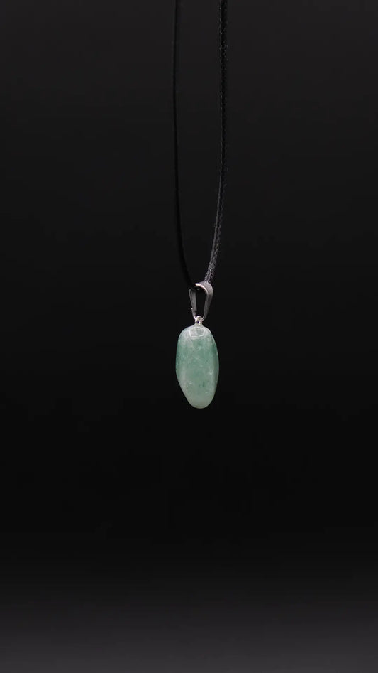 Products Green Fluorite Pendant over the black background.