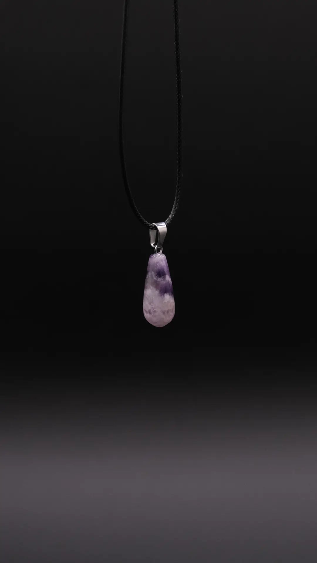 drop pendant in amethyst and black background